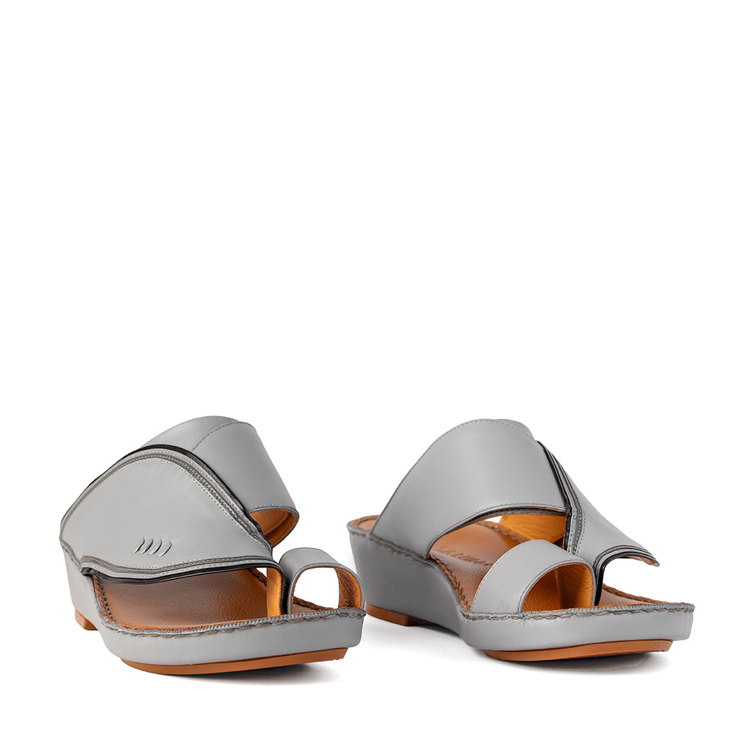 Gray leather sandals pair
