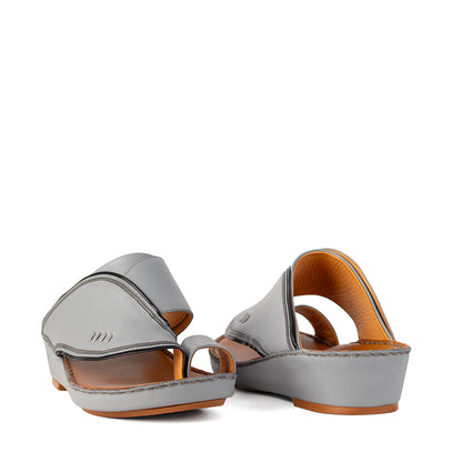 Gray leather sandals pair
